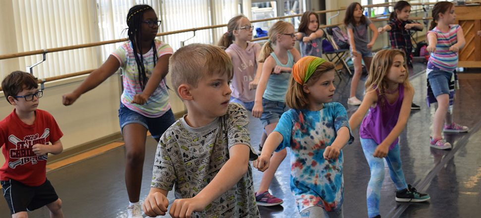 Campers dancing in studio