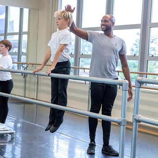 Antonio Douthit-Boyd in the studio with student