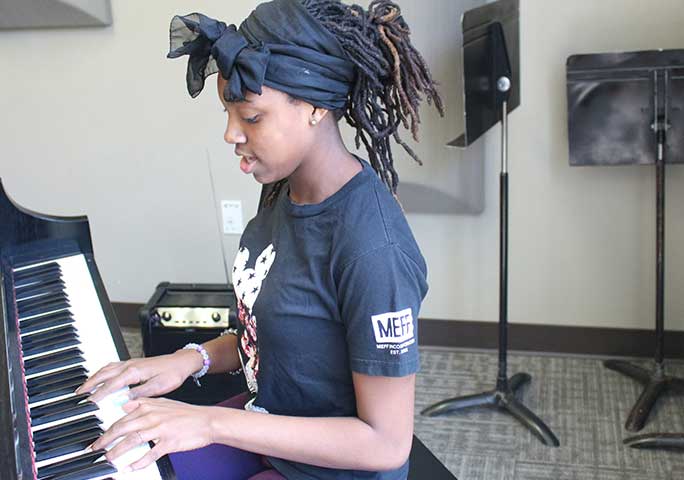 COCA vocal student at piano
